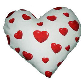 Cuscino forma cuore con cuoricini 